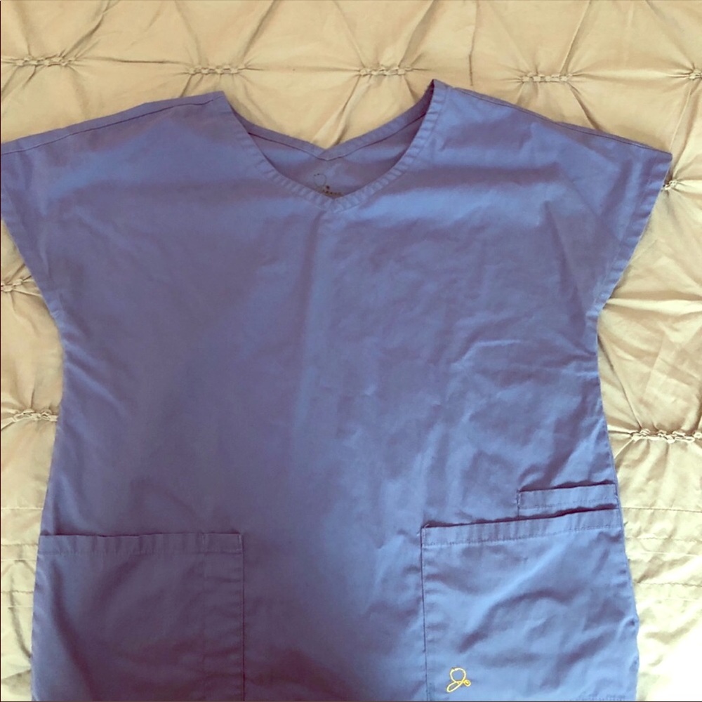 Jaanuu Peplum Scrub Top